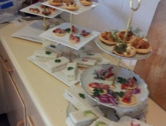 Display of trays set up for a High Tea