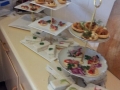 Display of trays set up for a High Tea